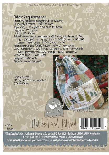 Back of a Hatched and Patched fabric bag pattern sheet showing fabric requirements, finished size, a color sample photo of a quilted bag, a bird logo, and a barcode on a beige patterned background.
Photo by Hatched and Patched [additional_image_link]