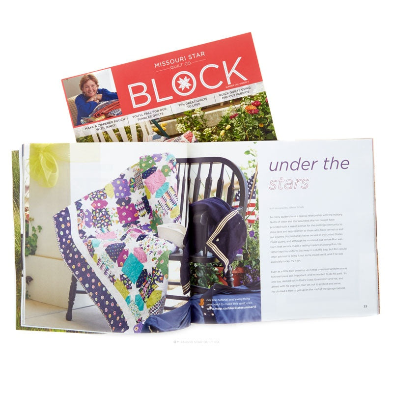 An open magazine or book spread showing a quilted patchwork blanket draped over a chair, with a red masthead reading MISSOURI STAR BLOCK on a separate folded page behind it. The spread includes a photo of the quilt, a chair, flowers, and article text on a white page.
[additional_image_link]
