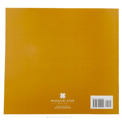 A square mustard yellow quilt package or backing card from Missouri Star Quilt Co, featuring the brand logo and a barcode label at the bottom.
[additional_image_link]