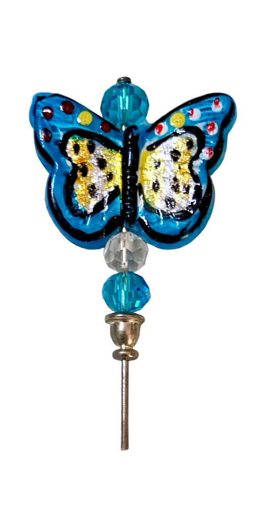 Decorative 5" stick pin with a blue multicolor glass butterfly lampwork, several complimentary glass beads, on a white background.
[image_link]