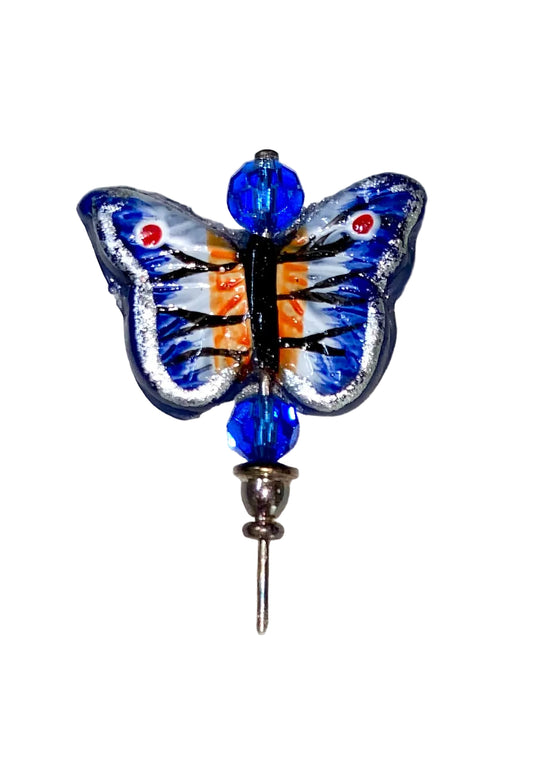 Decorative 5" stick pin with a blue and orange multicolor glass butterfly lampwork, several complimentary glass beads, on a white background.
[image_link]