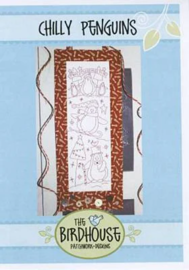 A craft pattern or scrapbook card design titled 'Chilly Penguins' by The Birdhouse Patchwork Designs, featuring a central rectangular panel with a white background and black line art illustrations of penguins, set against a light blue patterned border.
[additional_image_link]