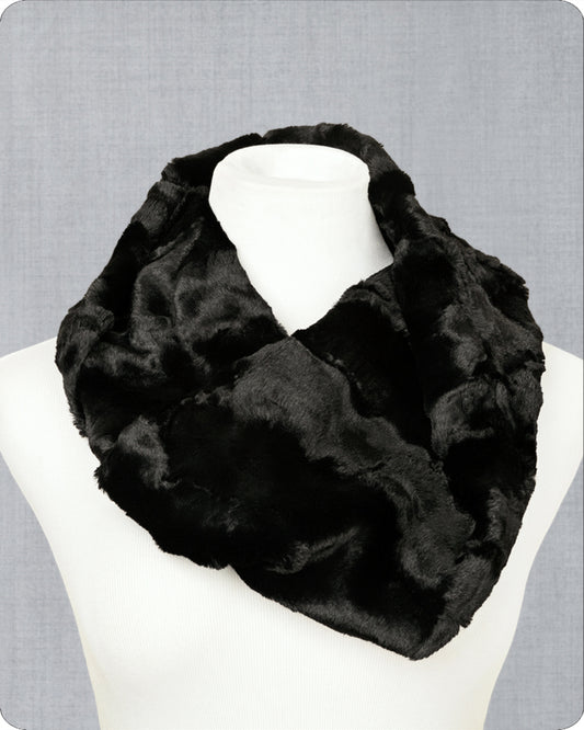 Black fur infinity scarf on a mannequin against a gray background.
Photo by Shannon Fabrics [image_link]