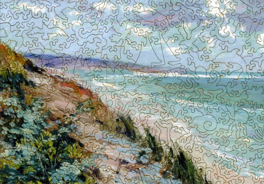 A wooden jigsaw puzzle depicting a coastal scene with cliffs and a sea view, featuring hand-drawn whimsical pieces.
Photo by Liberty Puzzles [image_link]