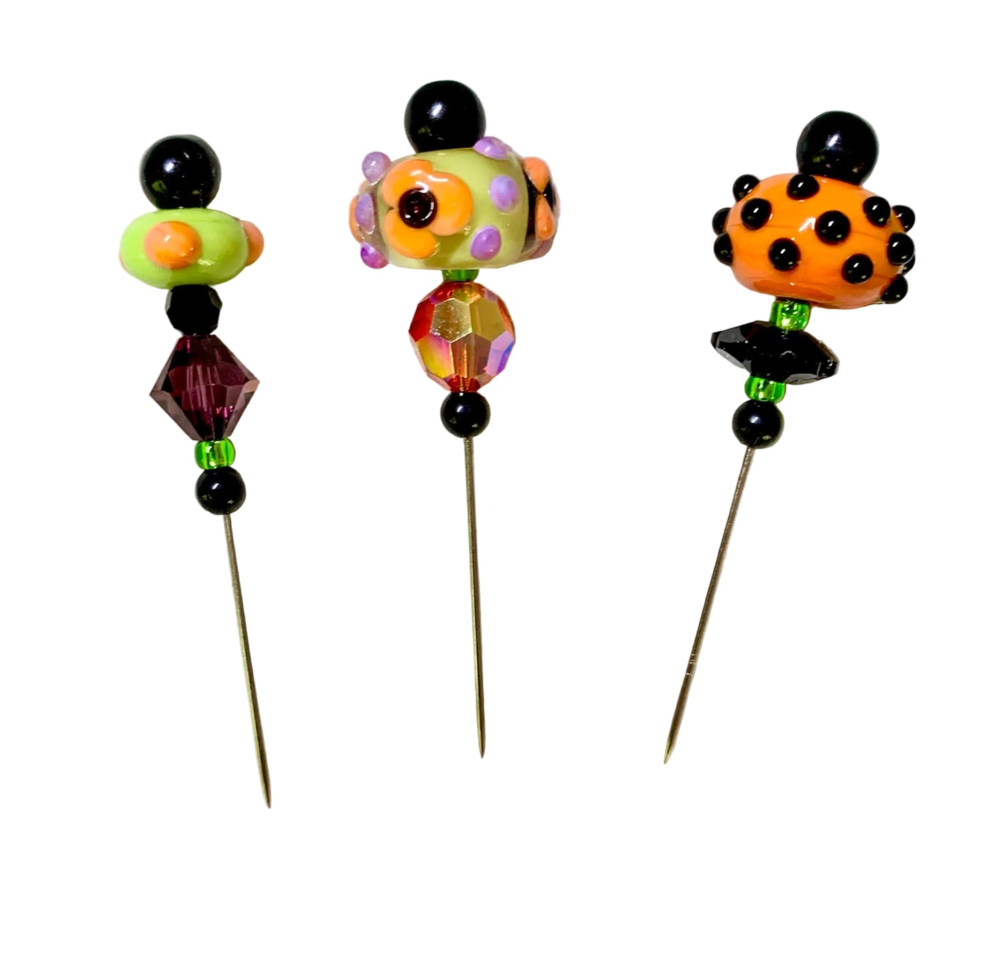 3 Decorative Halloween purple orange black green chacha pins with colorful glass beads on a white background. 
[image_link]