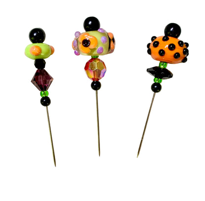 3 Decorative Halloween purple orange black green chacha pins with colorful glass beads on a white background. 
[image_link]