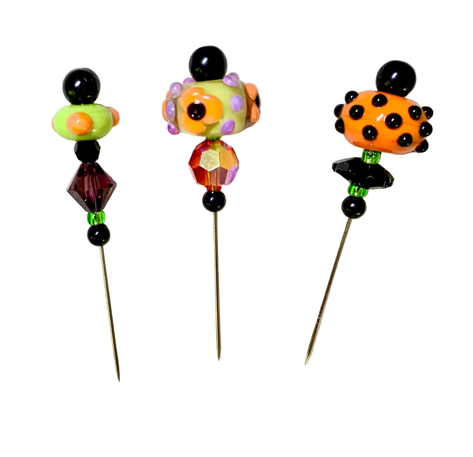3 Decorative Halloween purple orange black green chacha pins with colorful glass beads on a white background. 
[additional_image_link]