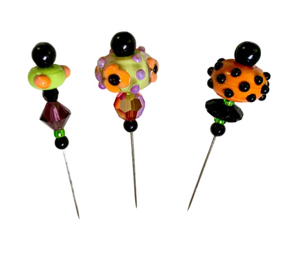 3 Decorative Halloween purple orange black green chacha pins with colorful glass beads on a white background. 
[additional_image_link]