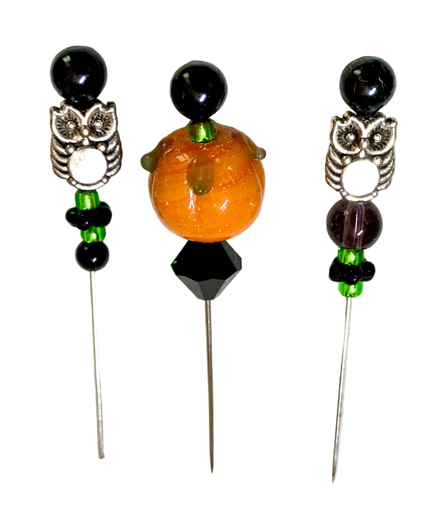 Three Halloween-themed beaded pins displayed on a white background. The left and right pins feature silver owl charms with black beads, and green accents.
[additional_image_link]