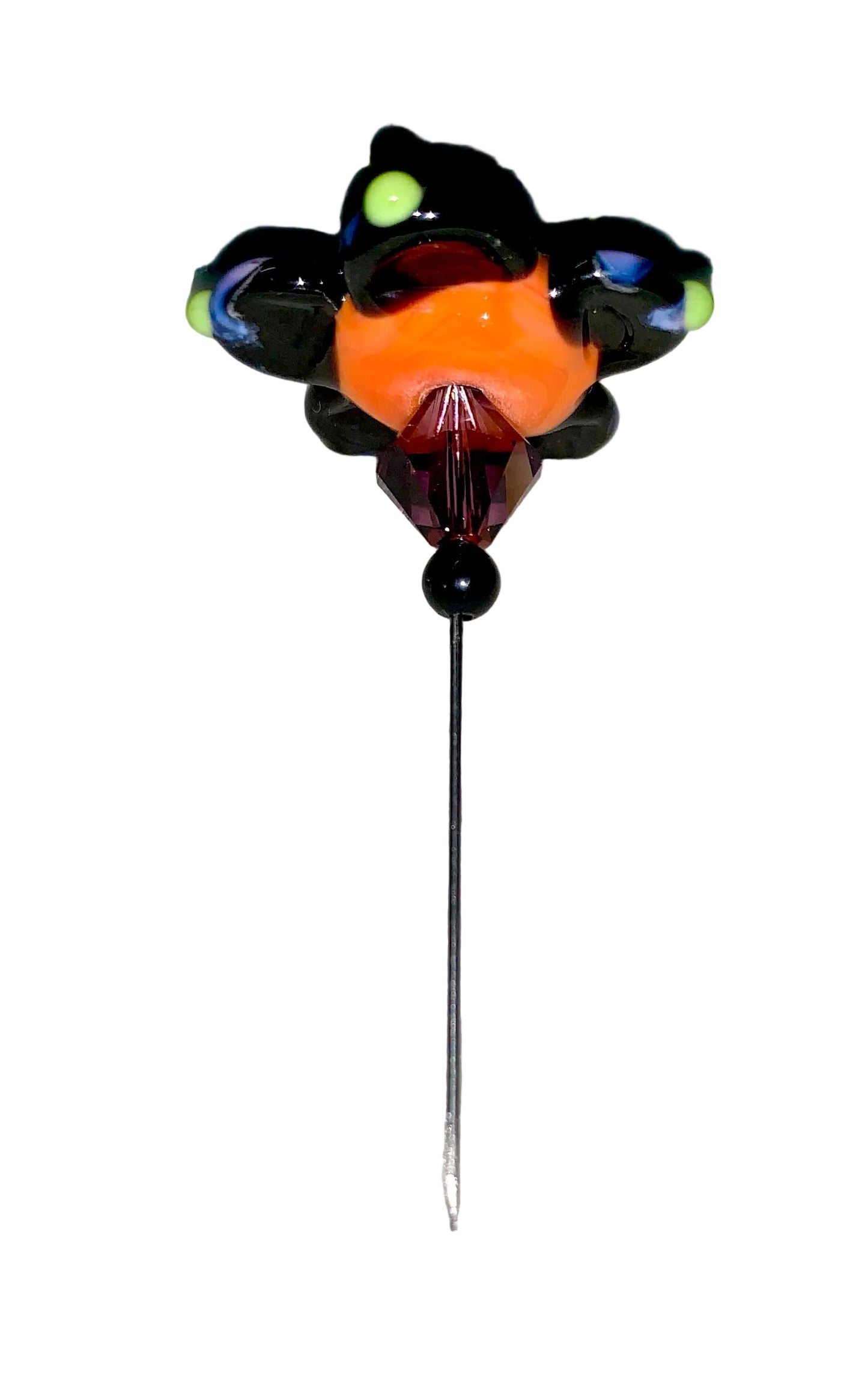 Decorative Halloween purple orange black green flower pin with colorful glass beads on a white background. 
[additional_image_link]