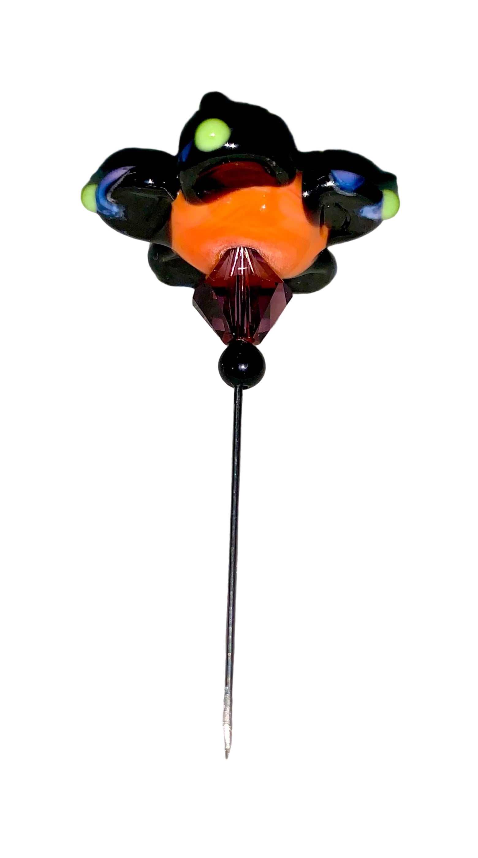 Decorative Halloween purple orange black green flower pin with colorful glass beads on a white background. 
[additional_image_link]