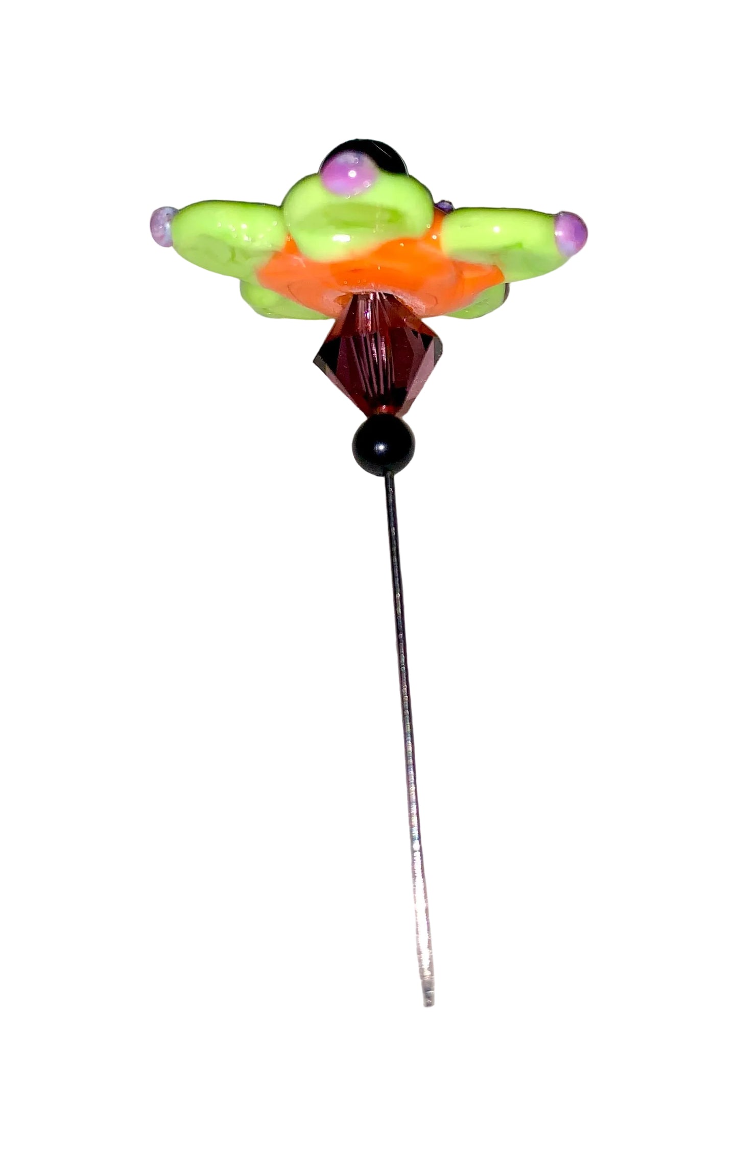 Decorative Halloween purple orange black green flower pin with colorful glass beads on a white background. 
[additional_image_link]