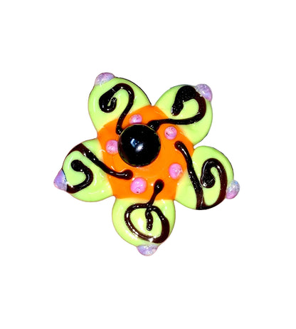 Decorative Halloween purple orange black green flower pin with colorful glass beads on a white background. 
[additional_image_link]