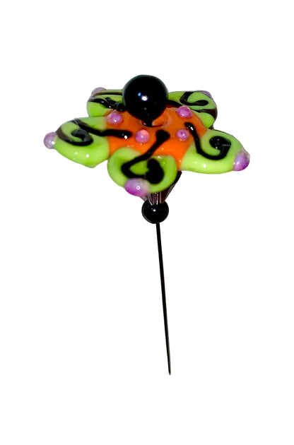 Decorative Halloween purple orange black green flower pinswith colorful glass beads on a white background. 
[additional_image_link]