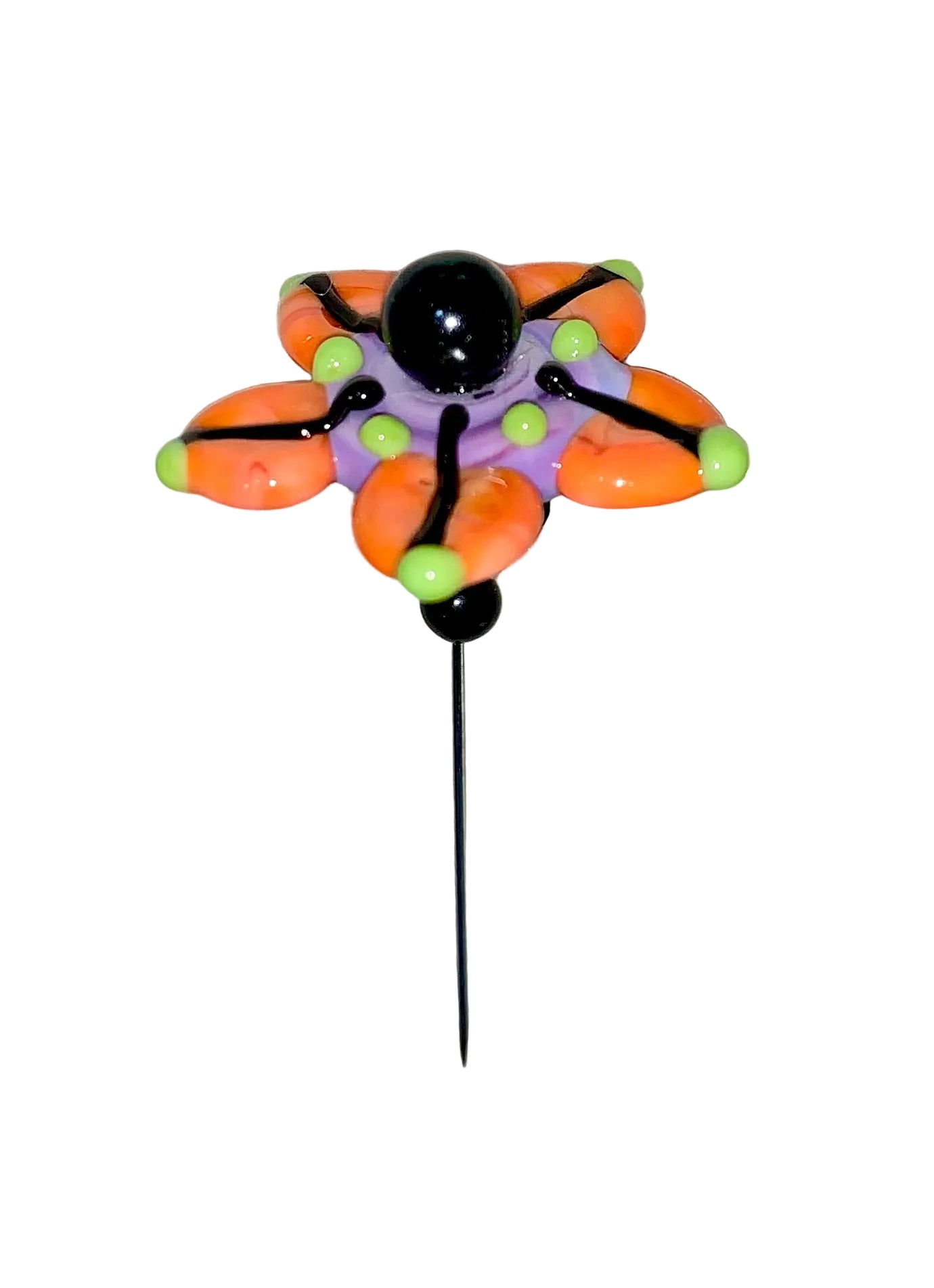 Decorative Halloween purple orange black green flower pin with colorful glass beads on a white background. 
[additional_image_link]