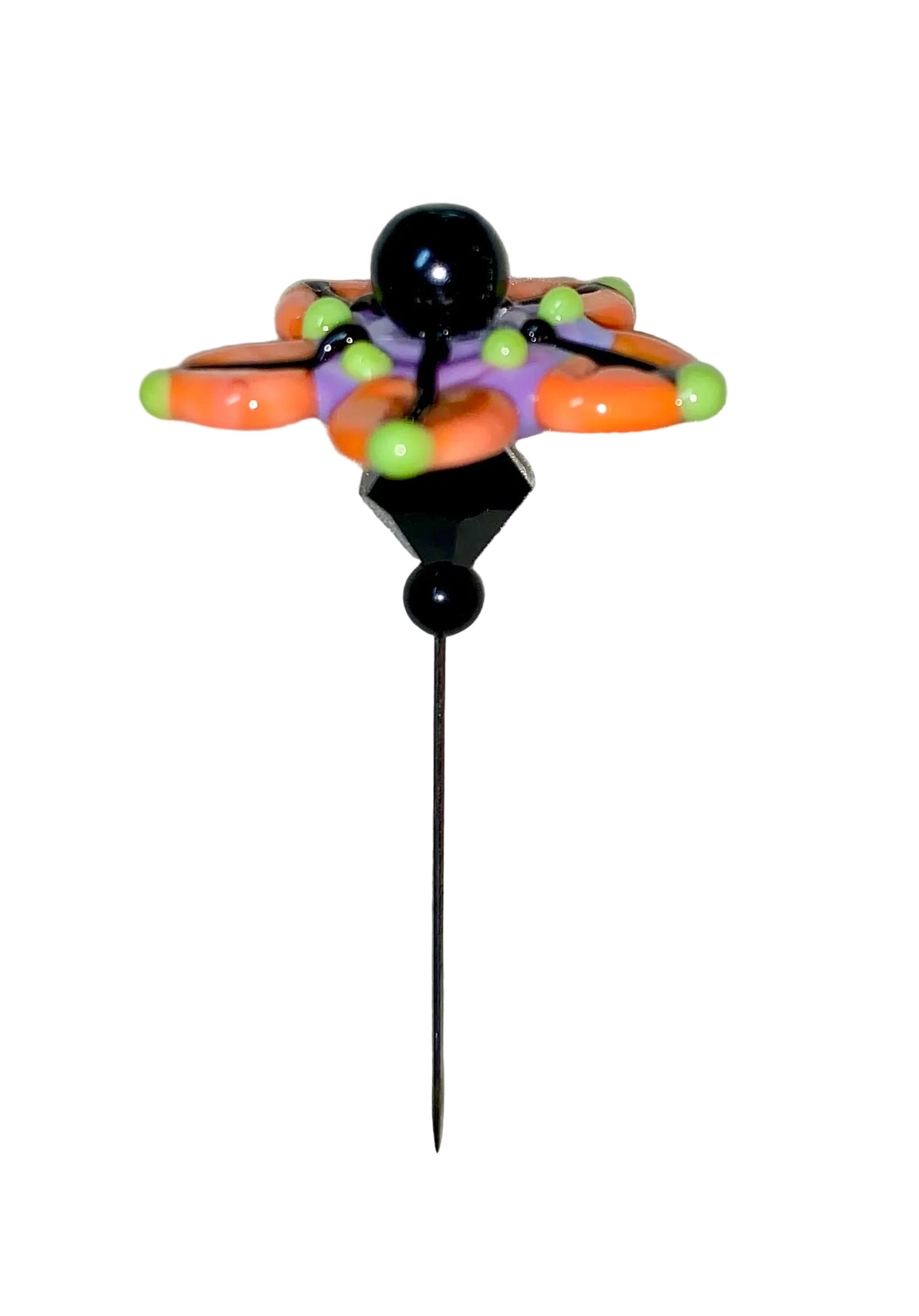 Decorative Halloween purple orange black green flower pin with colorful glass beads on a white background. 
[additional_image_link]