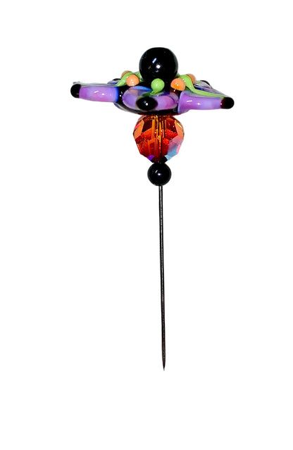 Decorative Halloween purple orange black green flower pin with colorful glass beads on a white background. 
[additional_image_link]