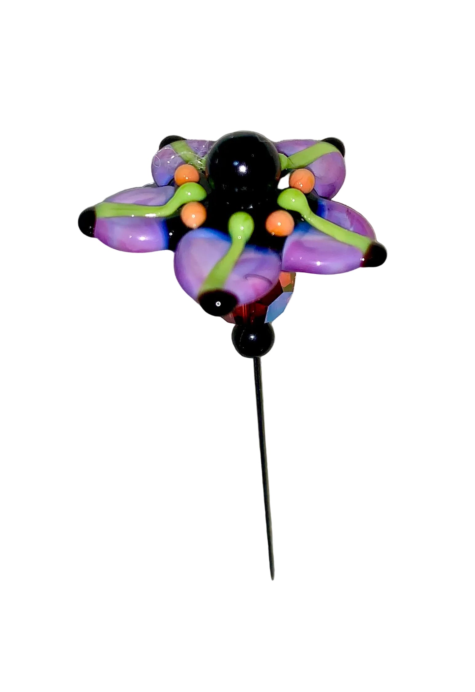 Decorative Halloween purple orange black green flower pin with colorful glass beads on a white background. 
[additional_image_link]