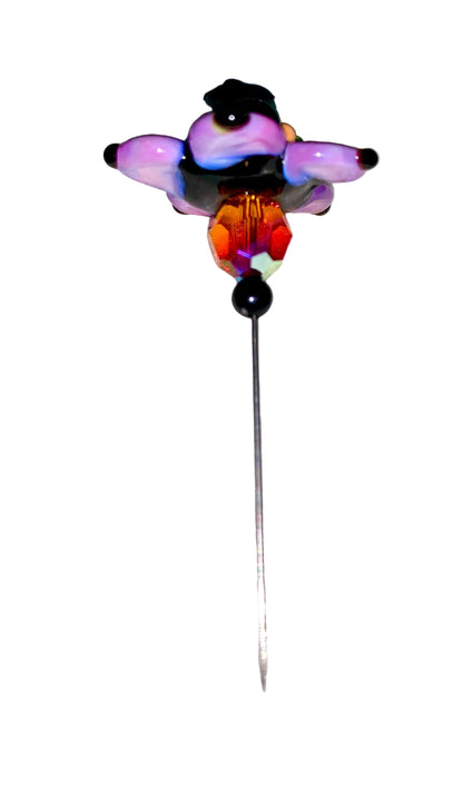 Decorative Halloween purple orange black green flower pin with colorful glass beads on a white background. 
[additional_image_link]