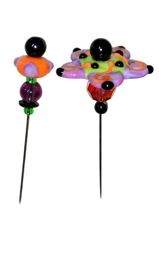 2 Decorative Halloween purple orange black green flower pins with colorful glass beads on a white background. 
[image_link]