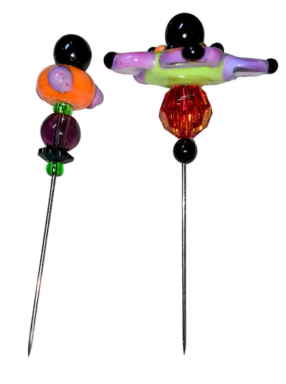 2 Decorative Halloween purple orange black green flower pins with colorful glass beads on a white background. 
[additional_image_link]