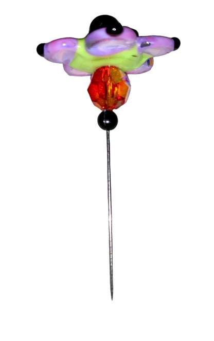 Decorative Halloween purple orange black green flower pin with colorful glass beads on a white background. 
[additional_image_link]