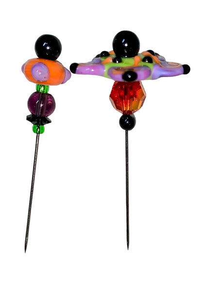 2 Decorative Halloween purple orange black green flower pins with colorful glass beads on a white background. 
[additional_image_link]