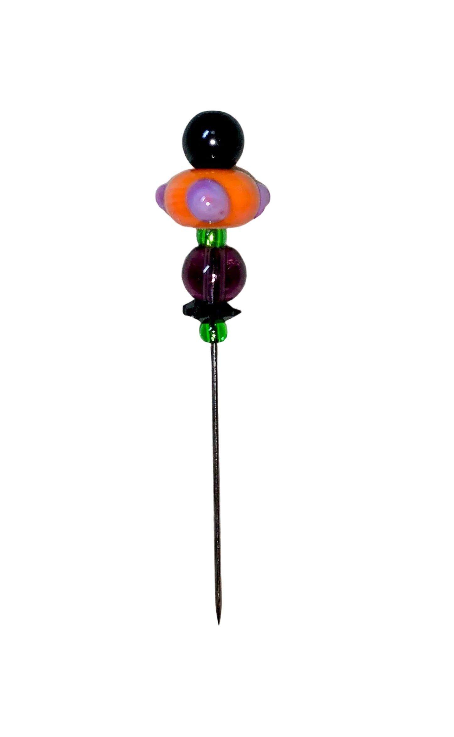 Decorative Halloween purple orange black green flower pin with colorful glass beads on a white background. 
[additional_image_link]