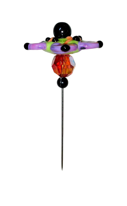 Decorative Halloween purple orange black green flower pin with colorful glass beads on a white background. 
[additional_image_link]