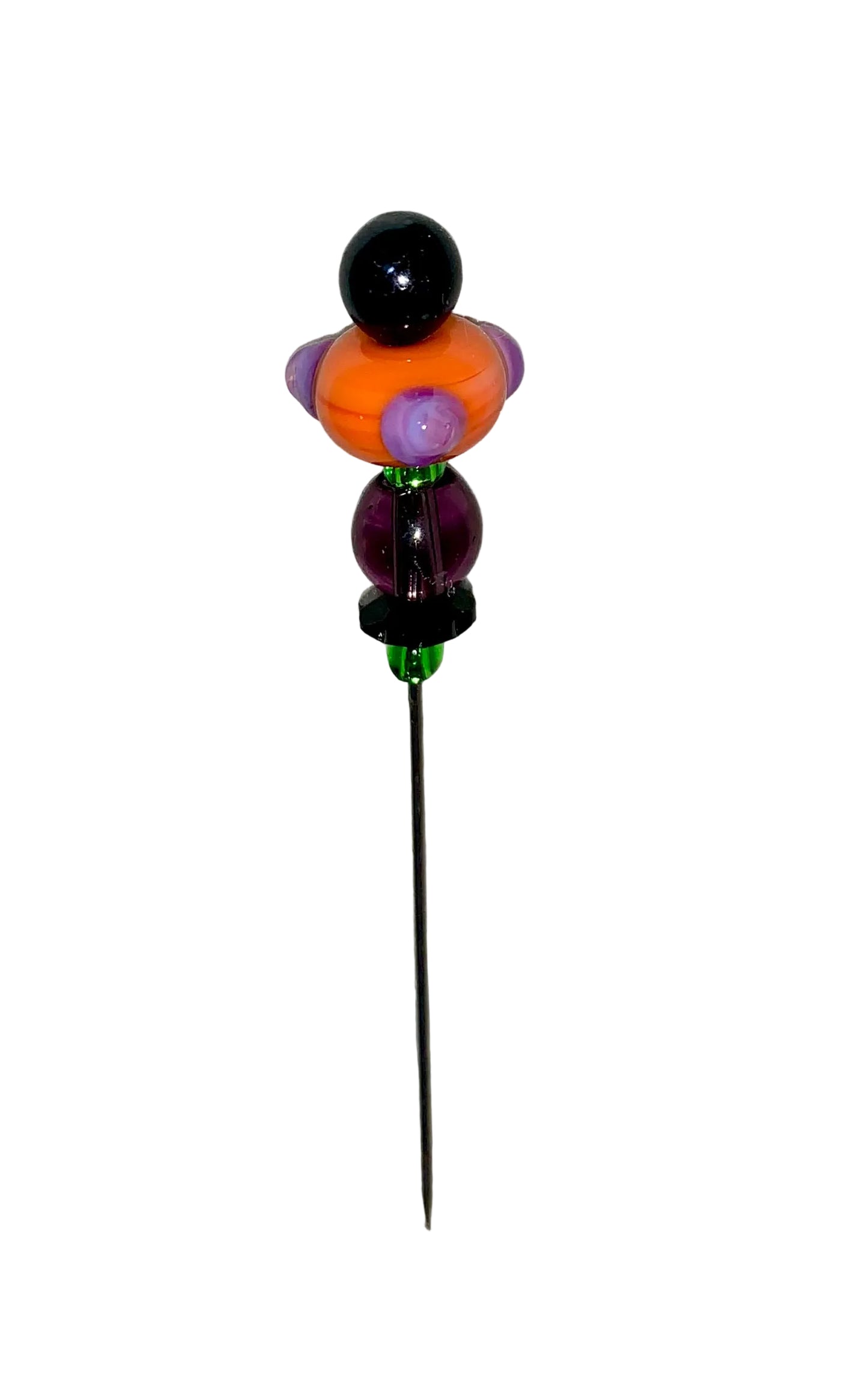 Decorative Halloween purple orange black green flower pin with colorful glass beads on a white background. 
[additional_image_link]