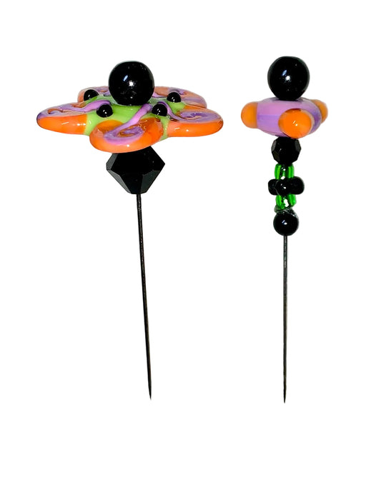 2 Decorative Halloween purple orange black green flower pins with colorful glass beads on a white background. 
[image_link]