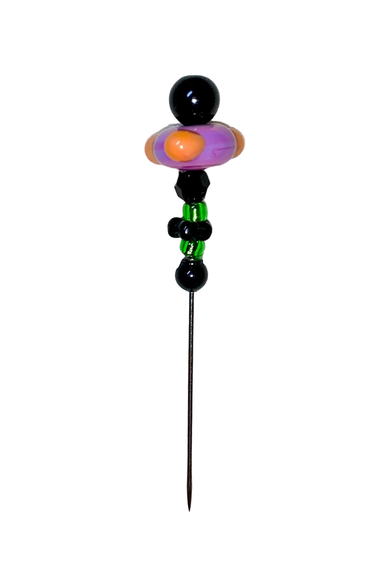 Decorative Halloween purple orange black green flower pin with colorful glass beads on a white background. 
[additional_image_link]