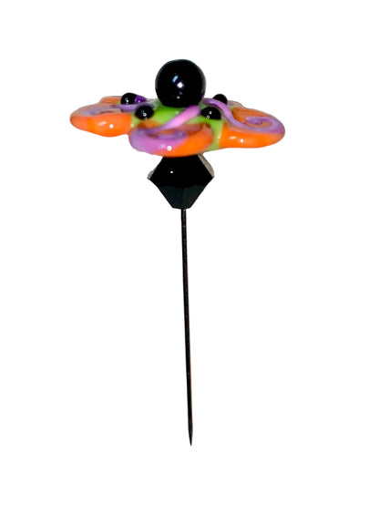 Decorative Halloween purple orange black green flower pin with colorful glass beads on a white background. 
[additional_image_link]