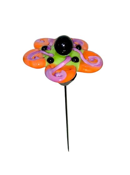 Decorative Halloween purple orange black green flower pin with colorful glass beads on a white background. 
[additional_image_link]