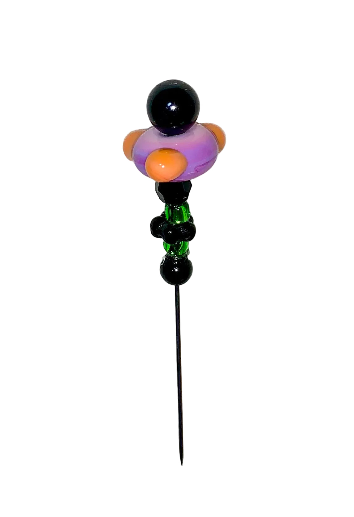 Decorative Halloween purple orange black green flower pin with colorful glass beads on a white background. 
[additional_image_link]