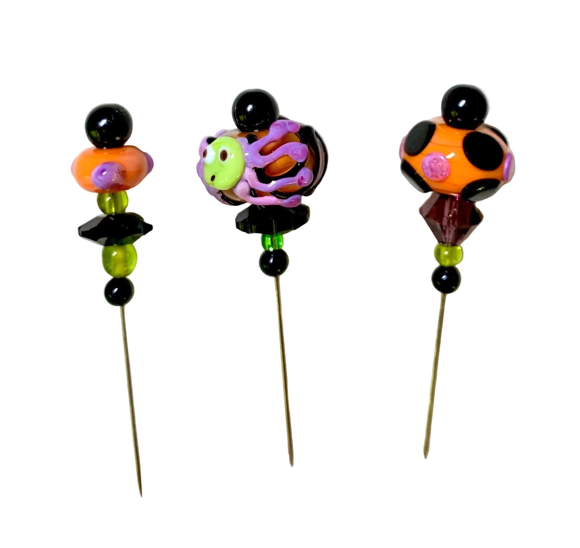 3 Decorative Halloween purple orange black green chacha pins with colorful glass beads on a white background. 
[image_link]