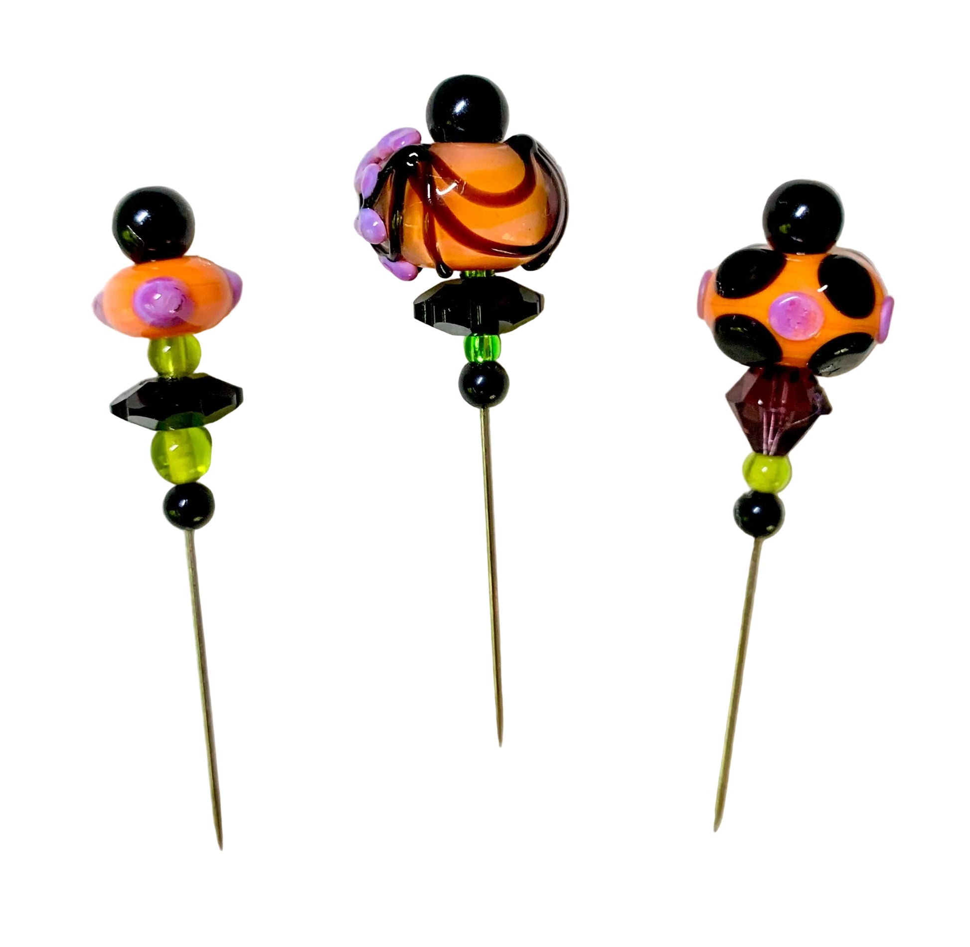 3 Decorative Halloween purple orange black green chacha pins with colorful glass beads on a white background. 
[additional_image_link]