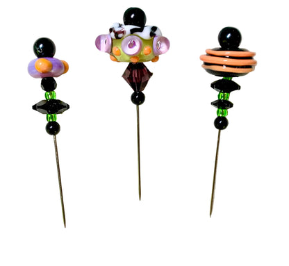3 Decorative Halloween purple orange black green chacha pins with colorful glass beads on a white background. 
[image_link]