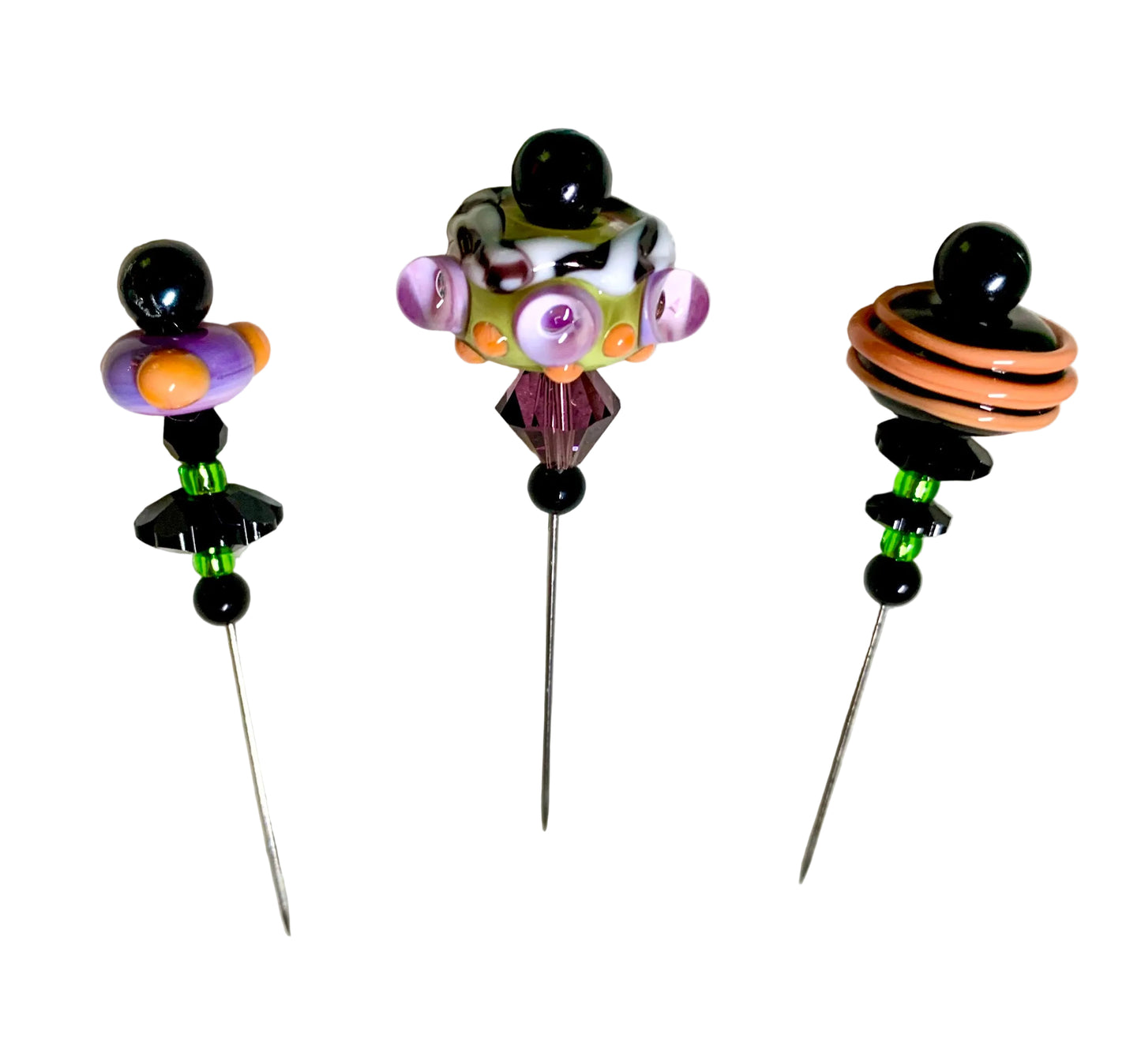 3 Decorative Halloween purple orange black green chacha pins with colorful glass beads on a white background. 
[additional_image_link]