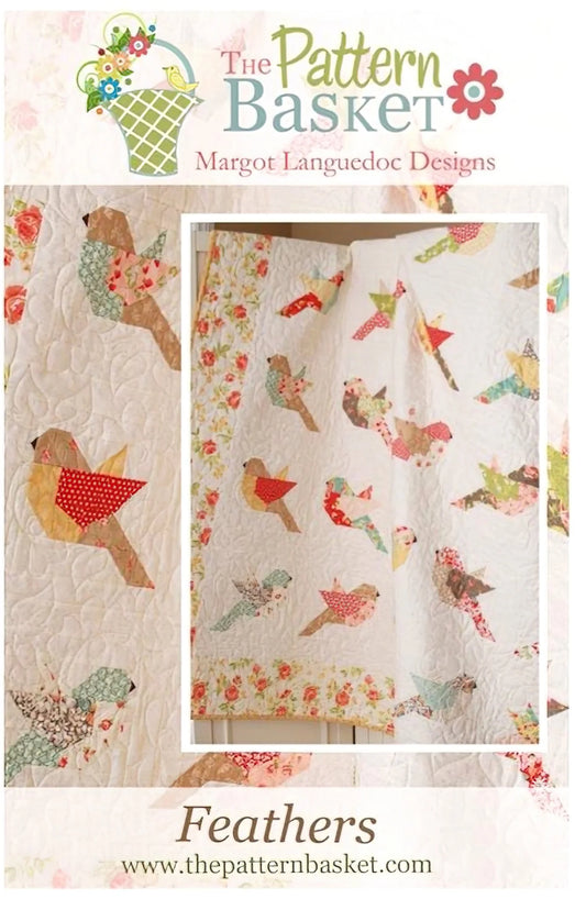 Pattern preview for 'Feathers' quilt pattern by The Pattern Basket, showing a white quilt with colorful bird and floral applique designs.
Photo by ThePatternBasket.com [image_link]