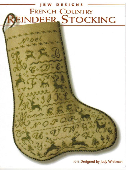 A vintage-style pattern cover for a French Country Reindeer Stocking design by JBW Designs, showing a beige embroidered stocking with dark brown stitched letters, reindeer motifs, and decorative borders on a white background.
Photo by JBW Designs [additional_image_link]