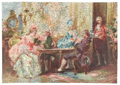 A completed jigsaw puzzle depicting a classical 18th-century social scene with several elegantly dressed people gathered indoors around a table, surrounded by ornate furniture and floral details.
Photo by Karen King [additional_image_link]