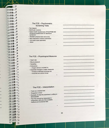 An open spiral-bound notebook showing handwritten notes and printed text pages, photographed on a green cutting mat background.
[additional_image_link]