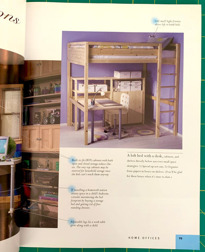 An open book or magazine page showing a large interior photo of a loft bed with a desk and shelving, accompanied by text callouts and a green cutting mat visible around the page edges.
[additional_image_link]