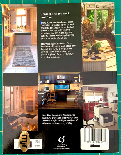 Back cover of an IdeaWise Activity Spaces book, featuring a black background with multiple interior and outdoor home photos, descriptive text, a logo, and a barcode.
[additional_image_link]
