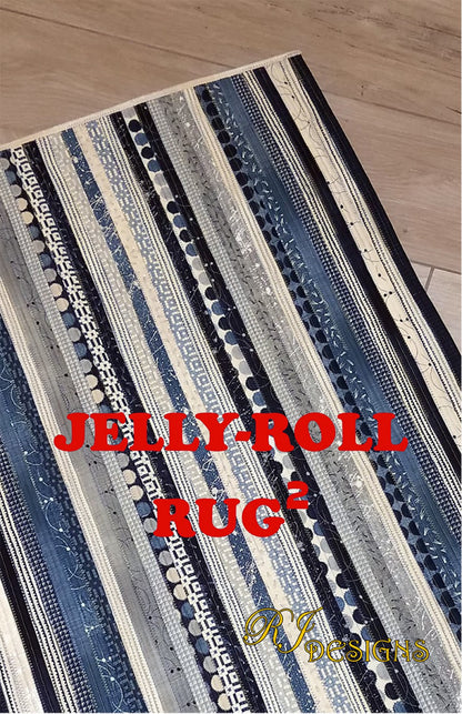 A rectangular area rug with a Jelly Roll pattern, featuring a variety of fabric stripes in different shades of blue and beige, and the text 'JELLY ROLL RUG' prominently displayed.
Photo by R.J .Designs [image_link]