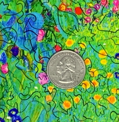 A jigsaw puzzle depicting a vibrant garden with sunflowers and various other flowers, reminiscent of Gustav Klimt's artwork.
Photo by Nautilus Puzzles [additional_image_link]