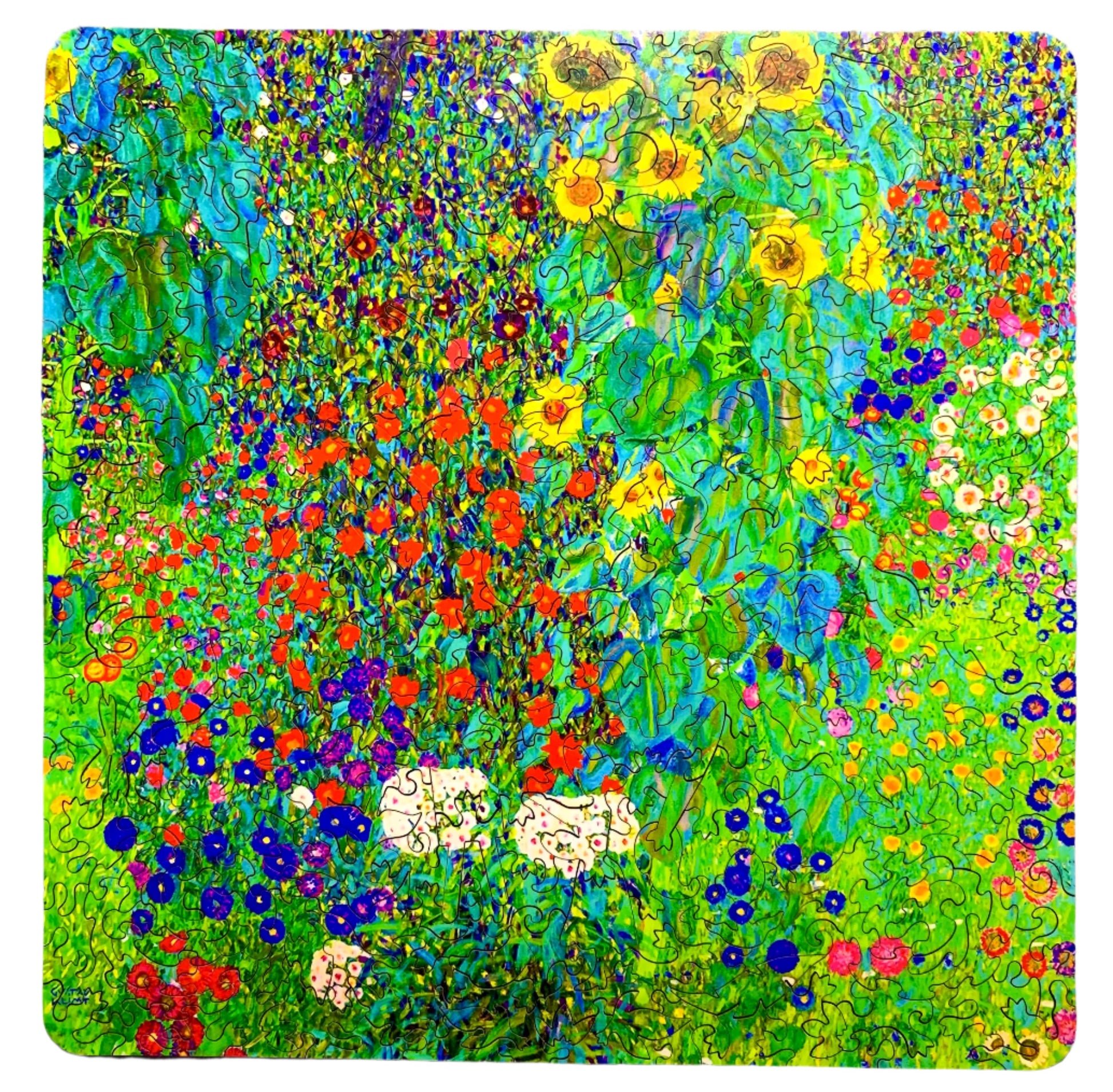 A jigsaw puzzle depicting a vibrant garden with sunflowers and various other flowers, reminiscent of Gustav Klimt's artwork.
Photo by Karen King [additional_image_link]
