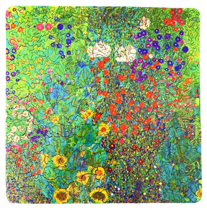 A jigsaw puzzle depicting a vibrant garden with sunflowers and various other flowers, reminiscent of Gustav Klimt's artwork.
Photo by Karen King [additional_image_link]