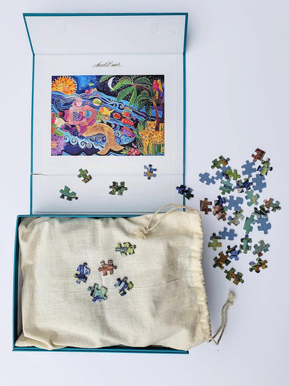 A colorful jigsaw puzzle box featuring a sea goddess design with a vibrant background and tropical elements.
Photo by Monarque [additional_image_link]